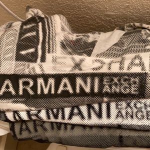 Three tee top vintage Armani shirts
